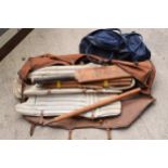 A vintage cricket set to include stumps and pads etc together with cased sets of boules (3).