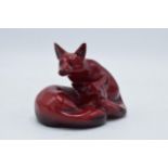 Royal Doulton Flambé pair of curled foxes HN117 (restored right ear). 13cm long. In good condition