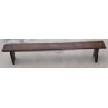 Victorian oak elongated foot stool, 126cm long, 22cm tall. In good functional condition with some