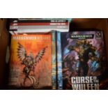 A collection of mainly Warhammer books to include Warhammer Visions, Curse of the Wulfen,