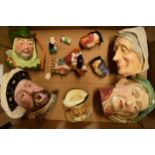 A collection of Toby and Character jugs to include Beswick Scrooge and Henry VIII, Sylvac Henry