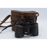 A cased pair of Carl Zeiss Jena Deltrinem 8x30 binoculars. In used condition with some signs of wear