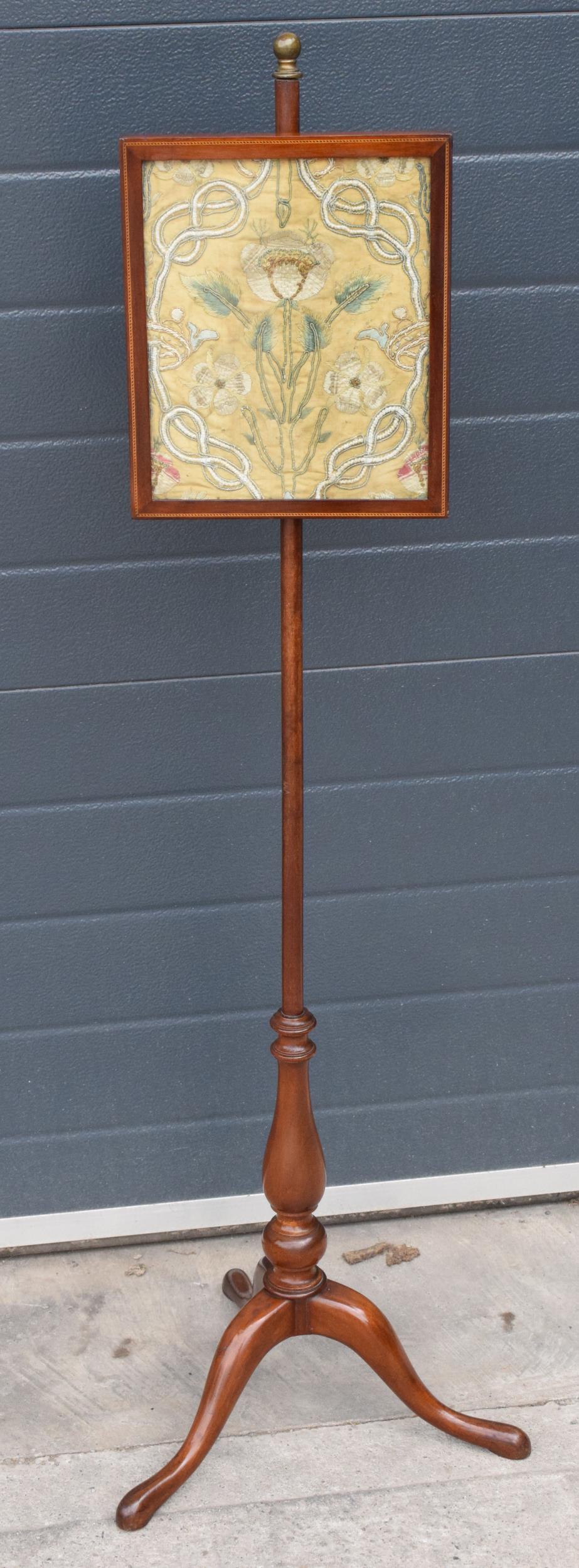 Georgian mahogany pole screen with silkwork panel on tripod base with inlaid decoration to panel