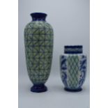 A pair of Moorland Pottery majolica style vases with green and blue decoration, tallest 38cm tall (