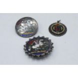 3 Victorian silver coins with enamelled decoration in the form of brooches and pendants (3).