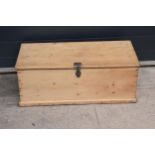 A stripped pine blanket box with later industrial handles, 80 x 41 x 31cm tall.