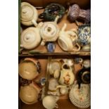 A mixed collection of 19th century and later pottery to include tea pots, a late 18th cen blue and