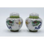 A pair of Japanese cloisonné ginger jars with dragon decoration on a light background, 8.5cm tall (