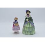 A pair of Royal Doulton lady figures to include A Victorian Lady HN1452 in rarer green colourway and