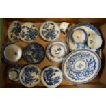 A collection of mainly 19th century blue and white pottery to include tea bowls, saucers and other