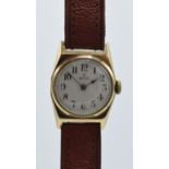 Rolex 9ct gold cased boys watch on leather strap, circa 1930s, winds up and in ticking order.