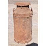 A vintage early to mid 20th century milk churn. 72.5cm tall.
