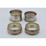 4 hallmarked silver napkin rings to include a pair, Chester 1923, one Birm 1924 and Birm 1921 (4).