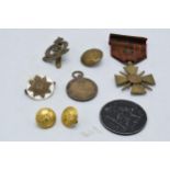 A collection of German and English military badges and medallions etc (Small Qty).