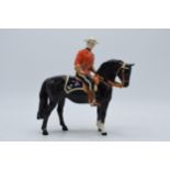 Beswick Canadian Mountie 1375. 21cm tall, damaged. The piece has experienced several damages to