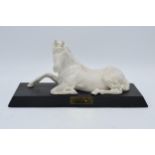 Beswick Spirit of Peace on wooden base. In good condition with no obvious damage or restoration.