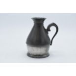 Pewter Dublin measure with tapered body and handle, 12.5cm tall.