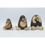 A trio of John Hughes pottery Groggs to include two penguins and an owl, tallest 14cm tall (3).