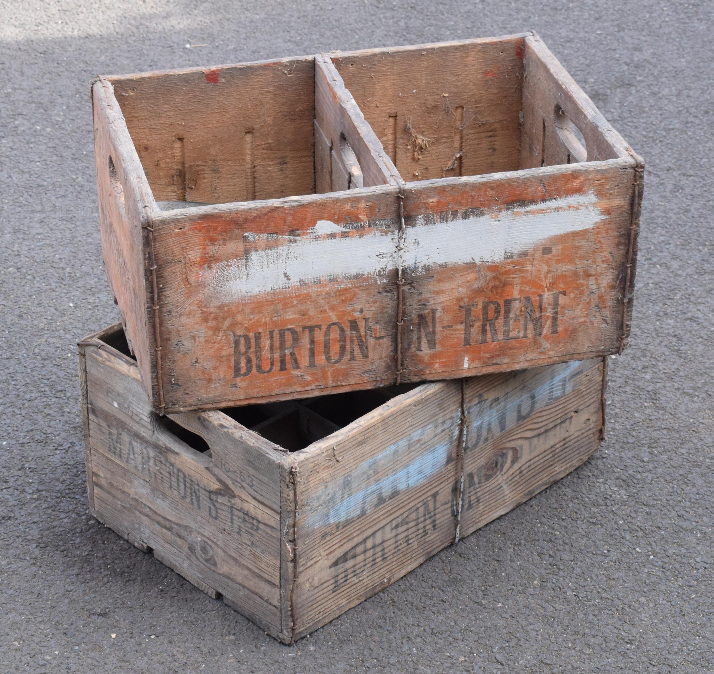 A pair of vintage Marston's of Burton upon Trent wooden beer bottle crates (2) with each holding