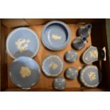 A collection of Wedgwood light blue Jasperware to include trinkets, bud vases, gloss-interior bowl