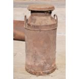 A vintage early to mid 20th century milk churn. 72.5cm tall.