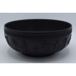 Wedgwood black basalt footed fruit bowl decorated with Dancing Hours design, diameter 25cm. In