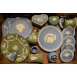 A collection of Wedgwood Jasperware of varying colours such as blue, sage green and teal to
