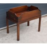 A 20th century wooden butler's tray on stand or similar with brass bounds, 67 x 43 x 69cm tall.