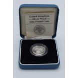 Boxed Royal Mint Silver Proof One Pound Coin with original paperwork.