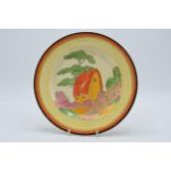 Bizarre by Clarice Cliff 23cm diameter plate with later added overpainted decoration of house and