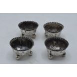 A set of 4 silver salts with crimpled rims on bun feet. Sheffield 1891. 47.8 grams.