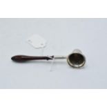 Silver candle snuffer with turned wooden handle, Birmingham 1992. 15cm long.