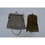 A pair of vintage chain mesh purses to include a white metal example and one similar (2).