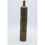 19th century brass Arabic cylindrical spice grinder, 29cm long.