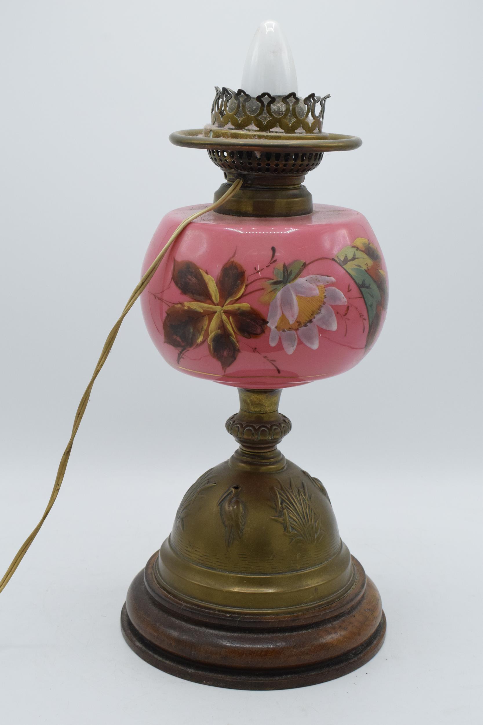 Late 19th century / early 20th century brass oil lamp with pink glass converted into electric