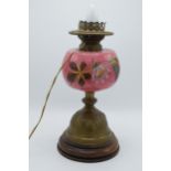 Late 19th century / early 20th century brass oil lamp with pink glass converted into electric