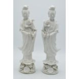 A pair of late 19th / early 20th century Blanc de Chine figures of Guan Yin modelled on a lotus