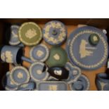 A collection of Wedgwood Jasperware of varying colours such as blue, sage green and teal to