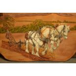 An unusual painted wooden slab / thick plank depicting a countryside scene of horses ploughing,
