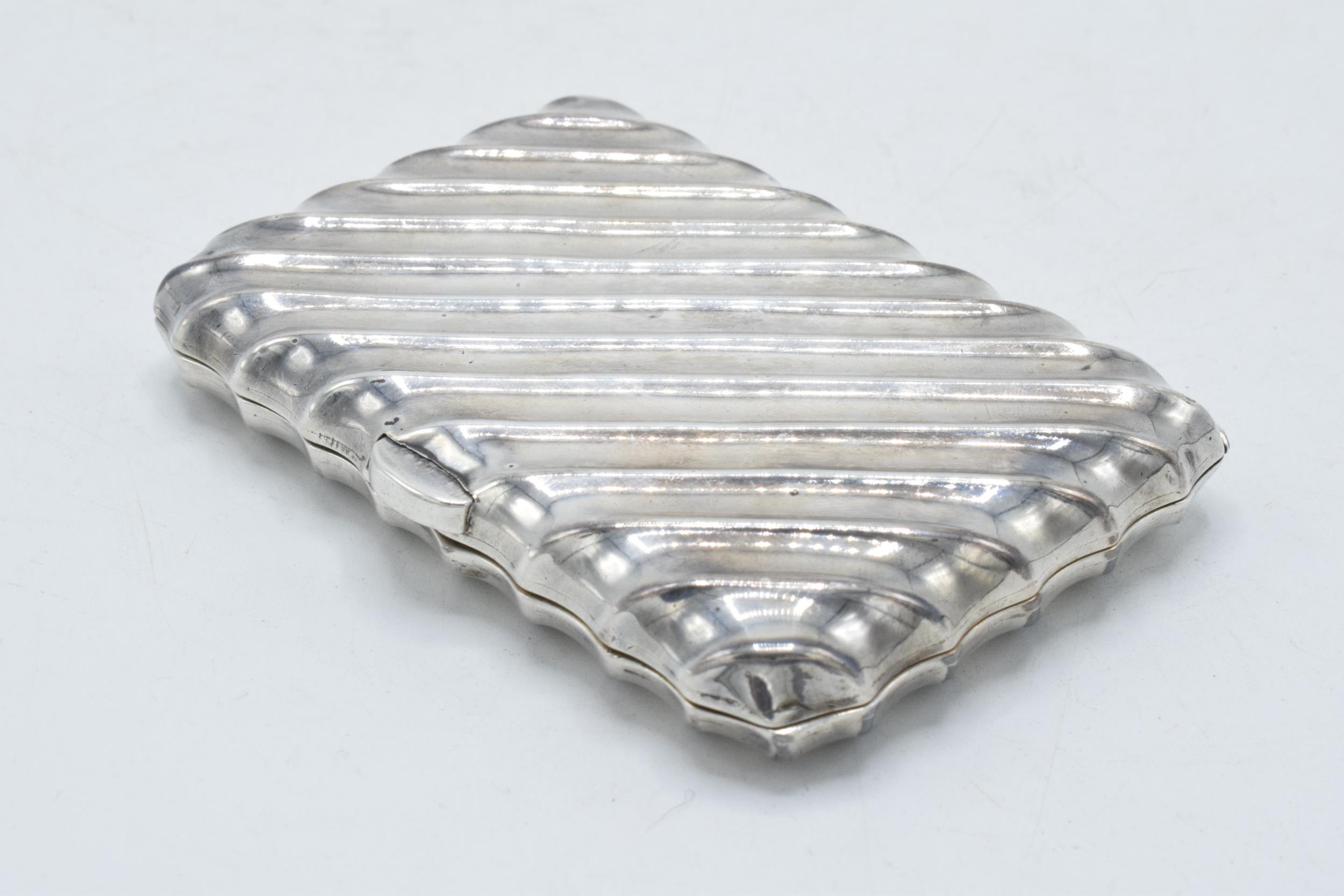 Silver ribbed cigarette case, 9cm long, 69.1 grams. Birmingham.