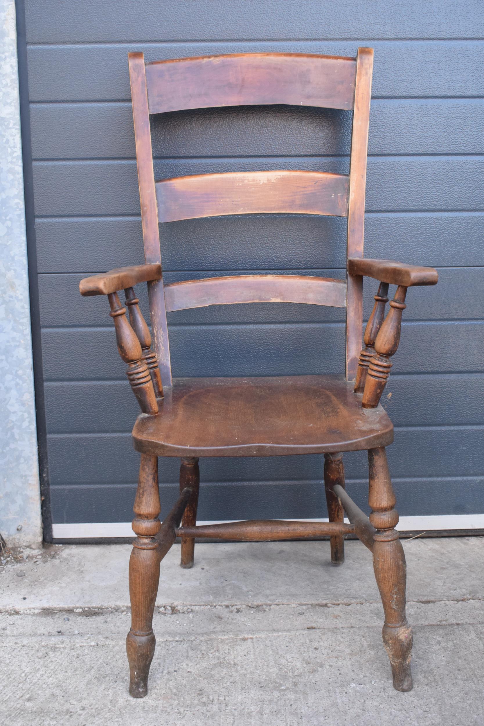 Victorian wooden farmhouse armchair, 112cm tall. Age-related wear and scuffs to include scratches - Image 5 of 5