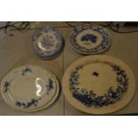 A collection of 19th century and later blue and white pottery to include meat plates, platters and