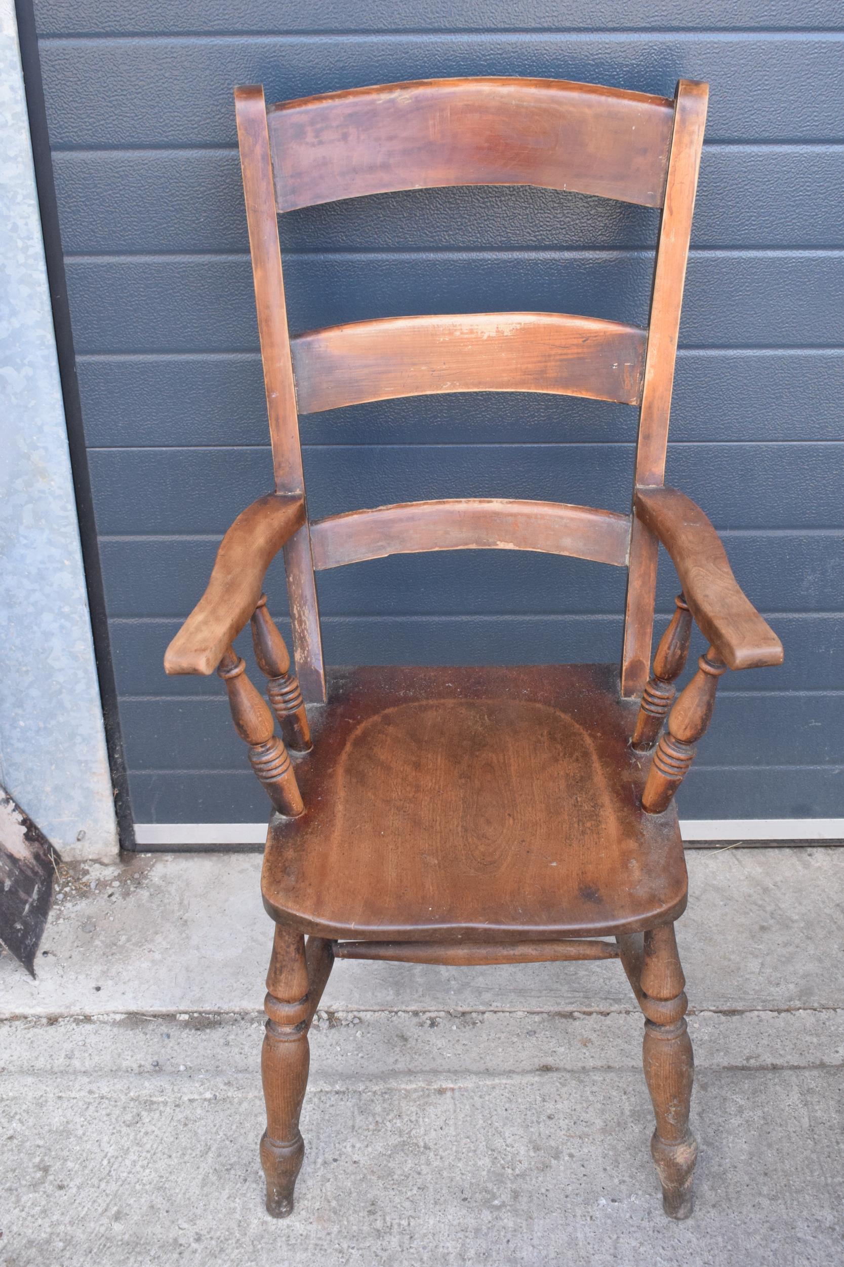 Victorian wooden farmhouse armchair, 112cm tall. Age-related wear and scuffs to include scratches - Image 4 of 5