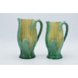 A near pair of late 19th / early 20th century majolica jugs in the form of maize / corn (2), tallest