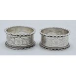 A pair of hallmarked silver ornate napkin rings, Birmingham 1888 (2). 40.1 grams.