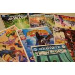 A large collection of modern Marvel / DC / DC Universe comics mostly in plastic wallets to include