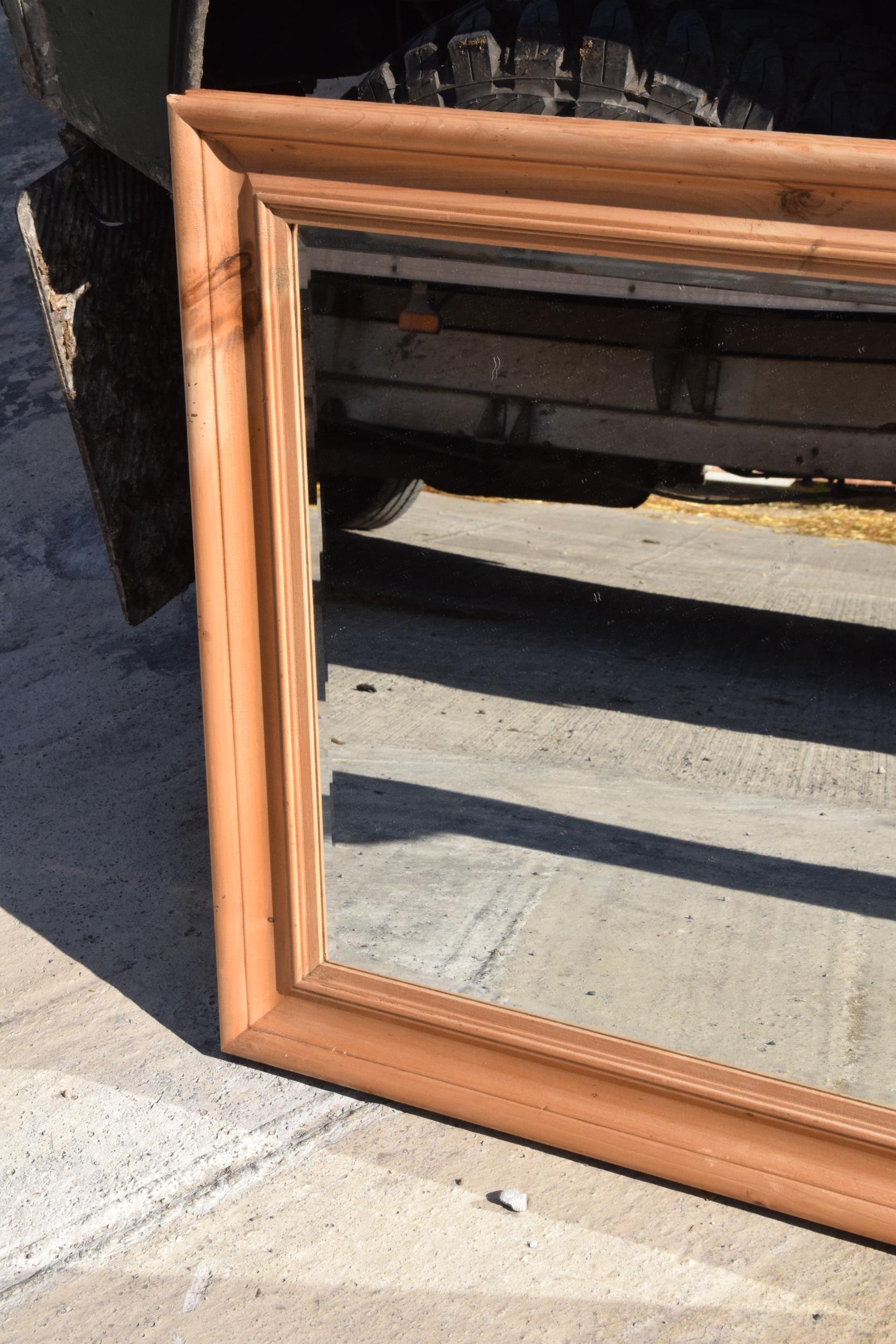 A vintage 20th century pine wall hanging bevel-edged mirror, 96 x 77cm. - Image 4 of 5