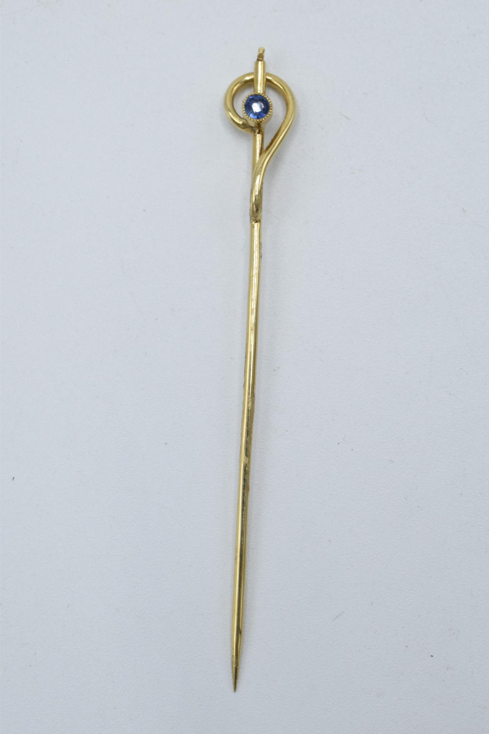 9ct gold stick pin set with sapphire, 1.2 grams, 6cm long.