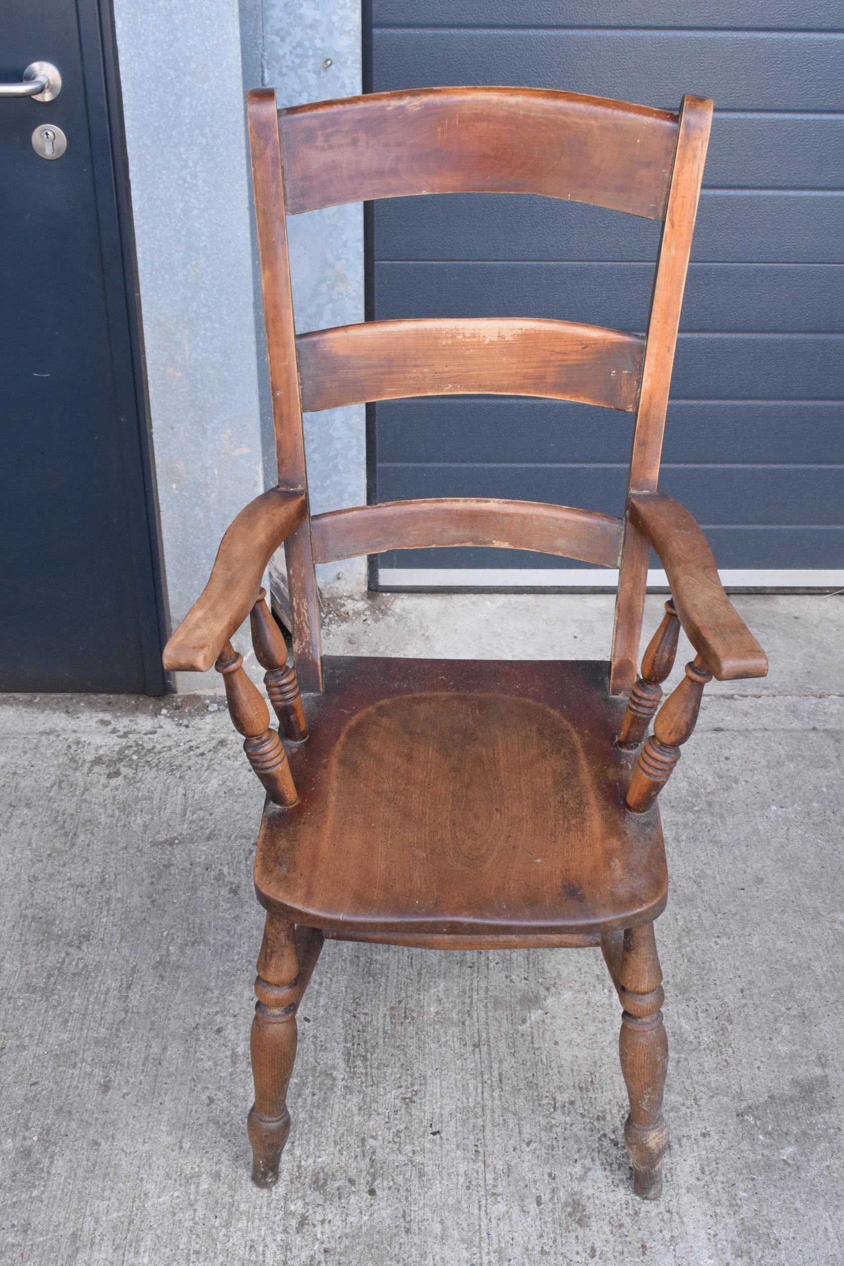 Victorian wooden farmhouse armchair, 112cm tall. Age-related wear and scuffs to include scratches - Image 2 of 5