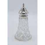 Silver topped cut-glass sugar sifter, Sheffield 1915, 16cm tall. Some nibbles to glass.